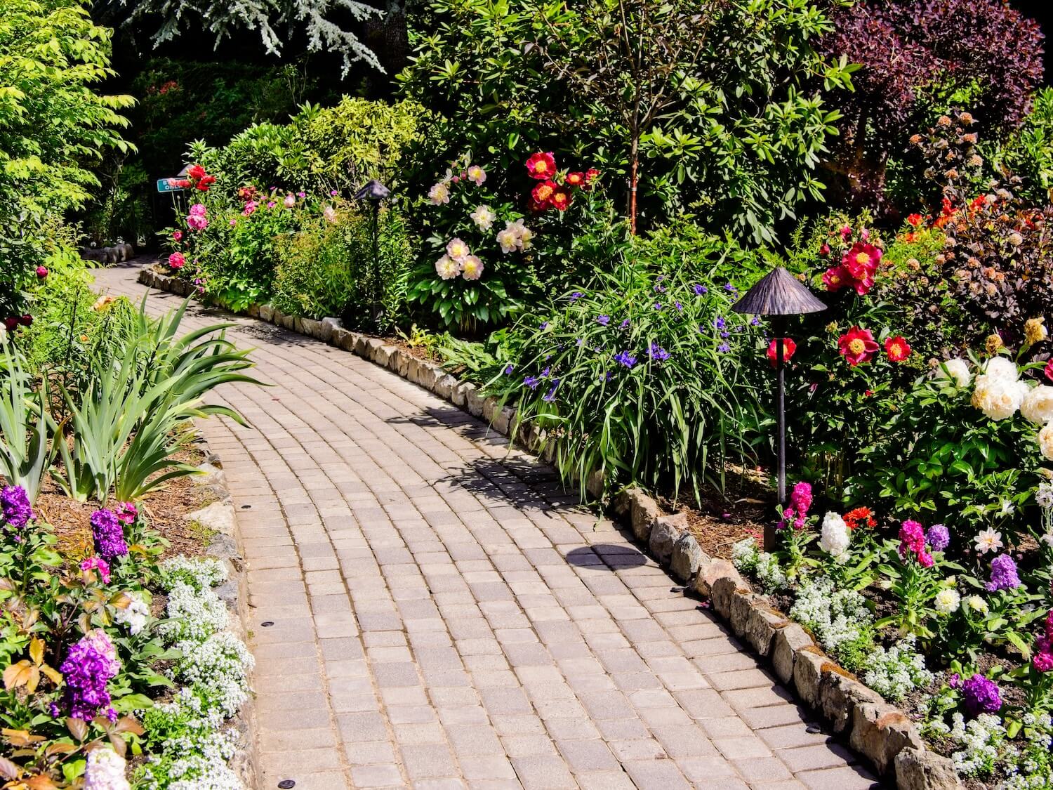 How Paver Walkways Can Make Your Outdoor Space More Elegant and Functional